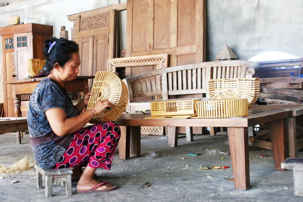 Artisan Checking And Adjusting Bamboo Bag