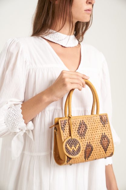 Wildindo leather handwoven handbag in tan with model